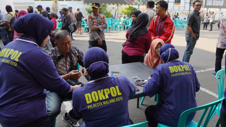 Polresta Malang Kota Gelar Bakkes Ajak Warga Makan Bersama dan Periksa Kesehatan Gratis